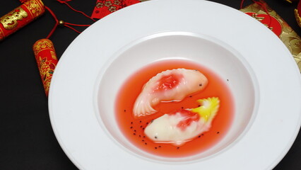 Fish jelly chinese food on plate in chinese new year celebration