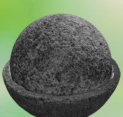 Sphère de pierre dans une vasque en basalte 