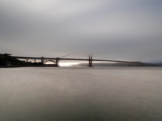 Fototapeta na wymiar San Francisco Golden Gate Bridge at the state of California embedded in fog
