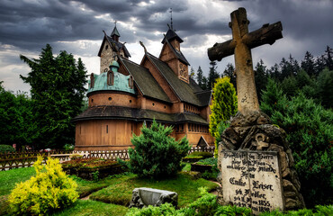 Old wooden Vang stave church in summer. Karkonosze mountains, Karpacz, Poland