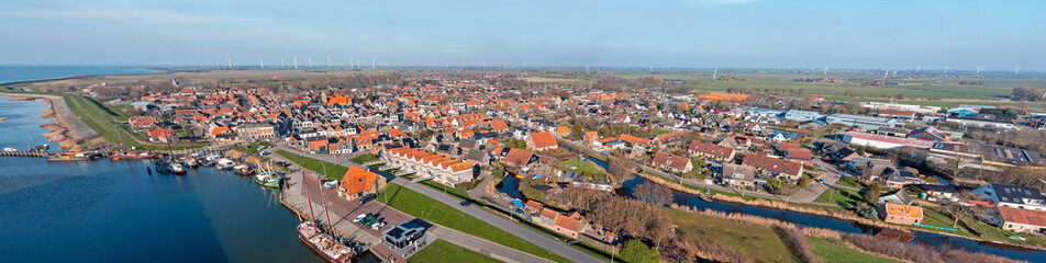 Fototapeta na wymiar Aerial panorama from the historical town Makkum in Friesland the Netherlands
