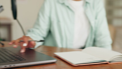 Radio presenter writing in notebook for broadcast, laptop live streaming and podcast online. Hands of news speaker, journalist and black woman planning ideas, blog research and audience information