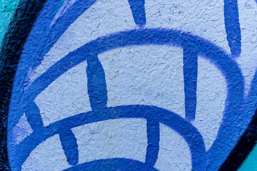 urban street art in painting on the wall aerosol graffiti in shape of net or bricks, netting...