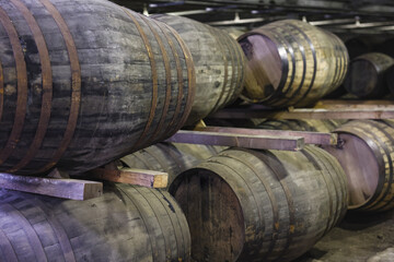 Oak barrels in a whiskey distillery