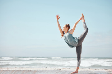 Health, fitness and yoga with woman meditation pose at a beach, stretching and training workout. Flexible female practice balance, energy and posture in nature, relax with zen and peace mindset