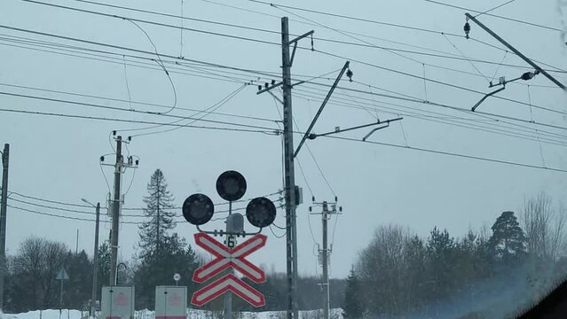 railway traffic light. railway traffic light is red. stop signal for a stop at a railway crossing