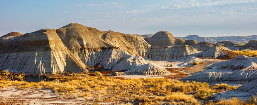 Panorama of the barren eroded badlands in the UNESCO World Heritage Site of Dinosaur Provincial Park, Alberta Canada
