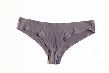 Women's old panties on a white background, close-up underwear