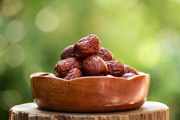 Jujube fruits on nature bokeh background.