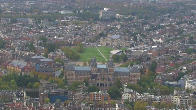 Aerial establishing shot of the Rijks museum in downtown Amsterdam, Netherlands