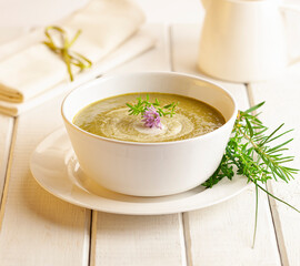 Delicious broccoli cream soup with cream and garlic. Healthy vegetarian food. Vegan menu. Top view, copy space.