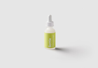 Mockup of beauty serum product bottle with customizable label available against customizable color and transparent background