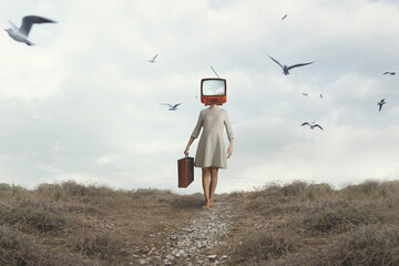 surreal woman with her head hidden by a tv projecting a sky and birds flying around free - 579706391