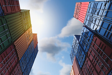 Warehouse of stacked cargo standard containers for temporary storage, loading, unloading and sorting at the container point. A lot of multi-colored containers on a specialized site.
