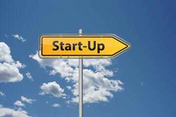 Yellow Startup Start up arrow sign in front of blue sky illustration