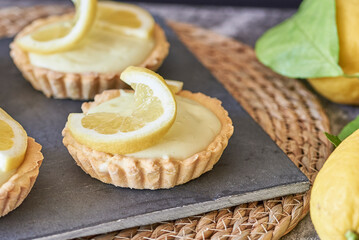 Lemon tart on a dark background 