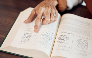 Naklejka premium Islamic, muslim and Quran with hand of old woman reading holy book for prayer, worship or ramadan kareem celebration. Arabic, God and religion with lady and dua for spiritual, faith and eid mubarak