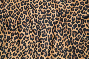 Leopard effect, fabric pattern. Background sample, seamless background print texture. Animal textil...