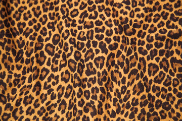 Leopard effect, fabric pattern. Background sample, seamless background print texture. Animal textil...