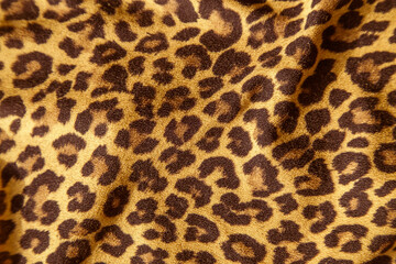 Fototapeta na wymiar Leopard effect, fabric pattern. Background sample, seamless background print texture. Animal textil design.