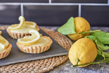 Lemon tart on a dark background 