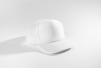 Trucker cap, snapback, all white, white mesh. Isolated on white. Mock-up for branding