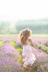 beautiful lavender field, beautiful things in the lavender field, blooming, purple, sunny field, girl bugging in lavender, woman holding a glass, headphones in flowers, spring atmosphere