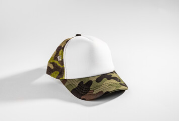 Trucker cap, snapback, camo with white front, camo mesh. Isolated on white. Mock-up for branding