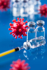 Close up medical syringe with a vaccine