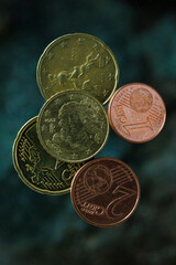 top view on different Euro coins lying on glass table - 579723765