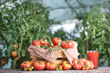 Vegetables, tomatoes on wooden desk