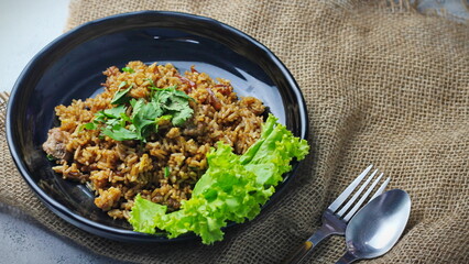 Fried rice in black plate,Train fried rice,Chinese style fried rice,Thai food.