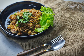 Fried rice in black plate,Train fried rice,Chinese style fried rice,Thai food.