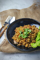 Fried rice in black plate,Train fried rice,Chinese style fried rice,Thai food.
