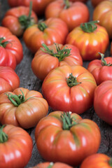Vegetables, tomatoes on wooden desk