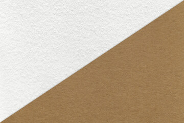 Fototapeta na wymiar Texture of craft white and beige paper background, half two colors, macro. Vintage dense kraft brown cardboard.