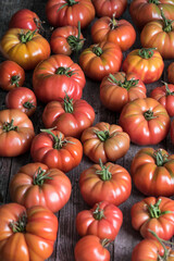 Vegetables, tomatoes on wooden desk