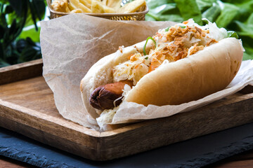 Hot dog with mayo, sauerkraut and crispy fried onion