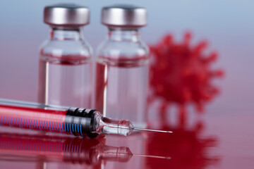 Close up medical syringe with a vaccine