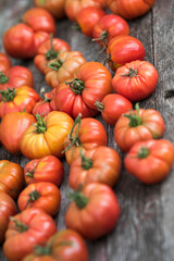 Vegetables, tomatoes on wooden desk