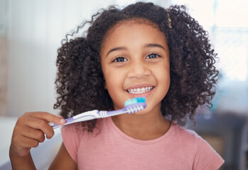 Young girl kids, portrait and brushing teeth, dental healthcare and bathroom toothbrush in Brazil...
