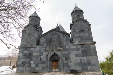 Fototapeta na wymiar Christian church. The old church is built of Basalt. Armenian Church Tegher. Monastery complex