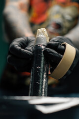 Piercing studio - a master with tools