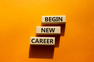 Begin new career symbol. Concept word Begin new career on wooden blocks. Beautiful orange background. Business and Begin new career concept. Copy space