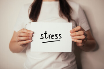 Stress - woman and card with psychological problems concept about mental problems