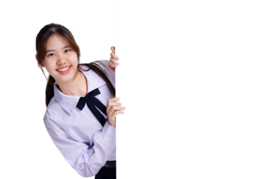 Happy pretty Asian student girl in school uniform holding white blank board beside with copy space. transparent background, PNG file format. - Powered by Adobe