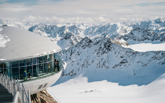 Cafe 3440 on the Pitztal Glacier. Austrias highest coffee house at mountain peak in Tirol, Pitztal Glacier and panoramic view of snow covered mountain rang