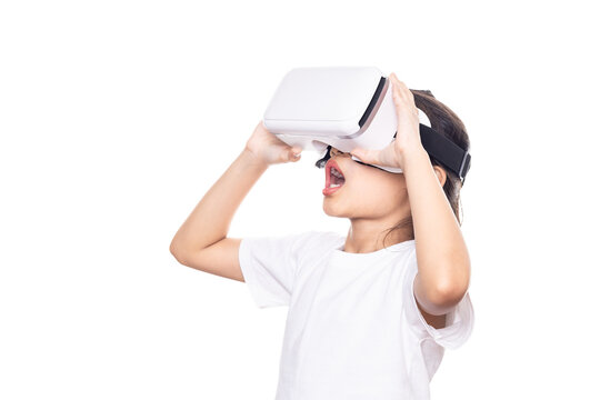 Kid using virtual reality headset, surprised child looking in VR glasses.