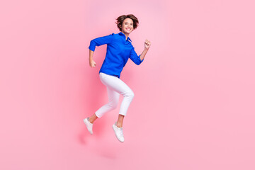 Fototapeta na wymiar Full length size photo of young funky girl jumping running fast speed deadline ending tasks business job isolated over pink color background