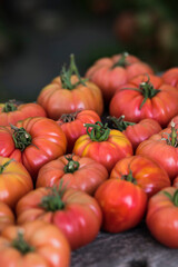 Vegetables, tomatoes on wooden desk